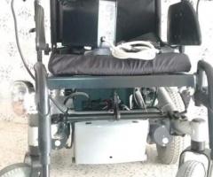 Chaise roulante électrique - 1
